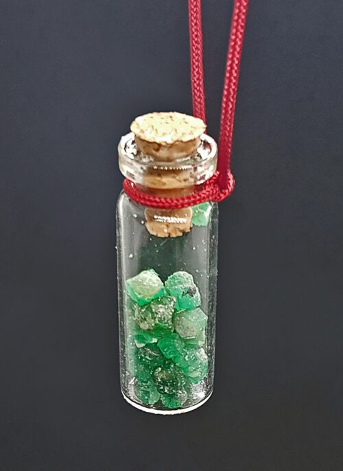 Small pendant bottle with emerald
